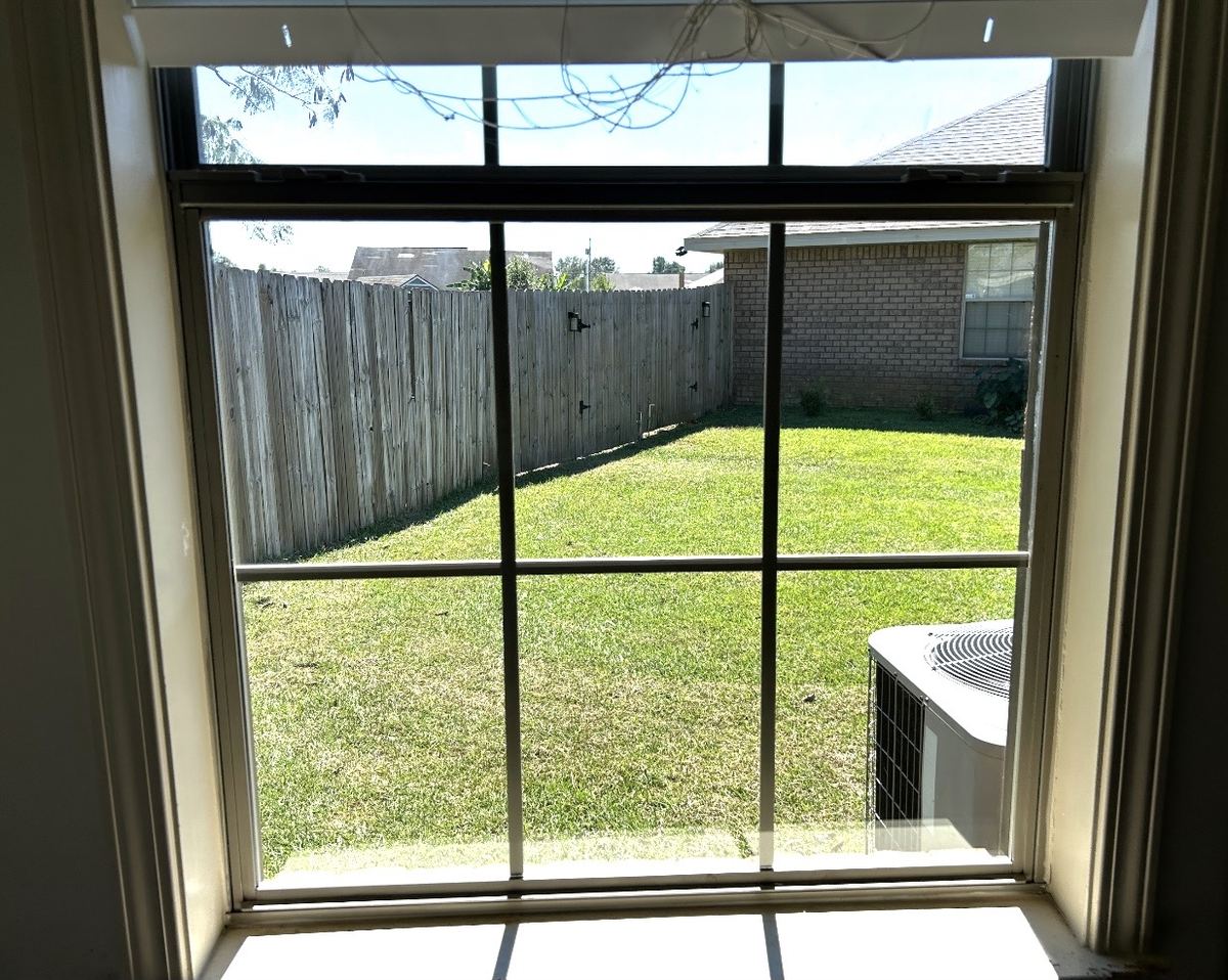 After: the same window with new clear glass installed